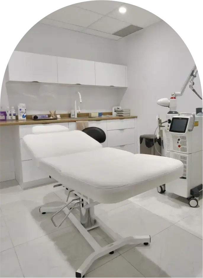 Pretty woman painting, with a bit of paint on one cheek